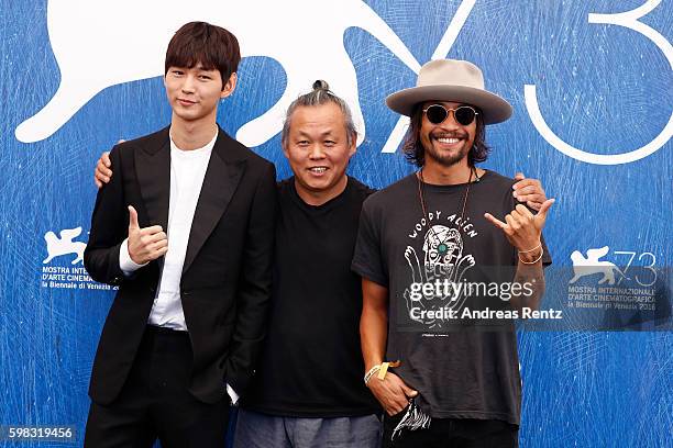 Actor Lee Won-gun, director Kim Ki-duk and actor Ryoo Seung-Bum attend a photocall for 'Geumul - The Net' during the 73rd Venice Film Festival at on...