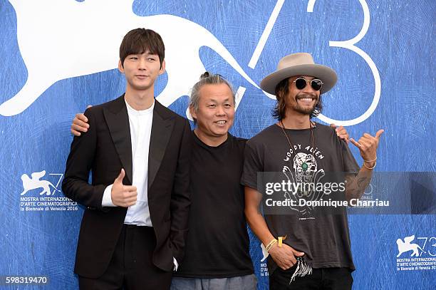 Actor Lee Won-gun, director Kim Ki-duk and actor Ryoo Seung-Bum attend a photocall for 'Geumul - The Net' during the 73rd Venice Film Festival at on...