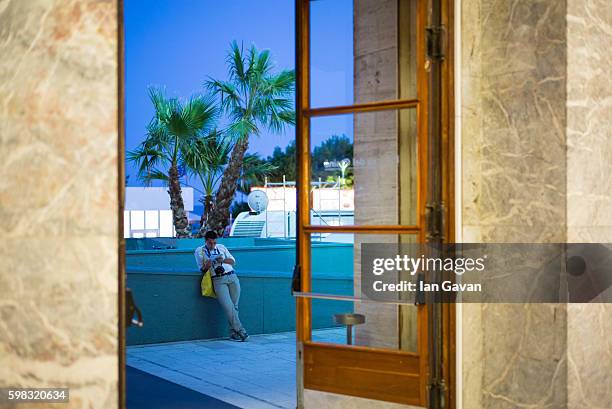 Visitor is seen outside the Palazzo del Cinema during 73rd Venice Film Festival on August 31, 2016 in Venice, Italy.
