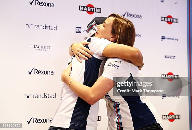 Felipe Massa of Brazil and Williams and Williams Deputy Team Principal Claire Williams hug after Felipe announced his retirement from Formula 1 at...