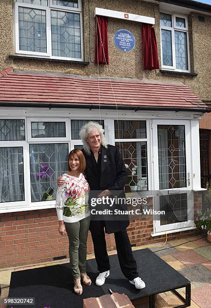 Brian May and Kashmira Cooke attend the unveiling of an English Heritage Blue Plaque, commemorating where Freddie Mercury lived on September 1, 2016...