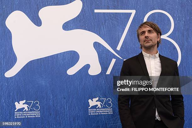 Actor Jens Harzer poses during a photocall of the movie "Les Beaux Jours d'Aranjuez" presented in competition at the 73rd Venice Film Festival on...