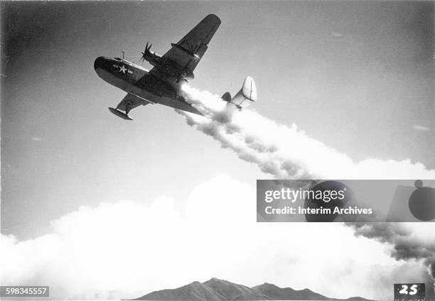 View of a US Navy PBM taking off and climbing to altitude in a matter of seconds with the assistance of jet propulsion, October 1944.