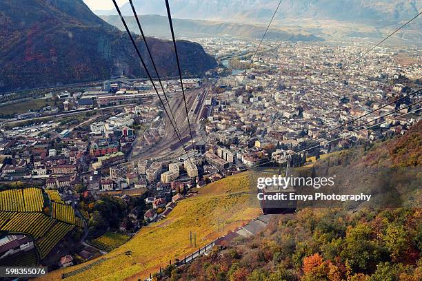 cable car above bolzano, south tyrol, italy - bolzano stock pictures, royalty-free photos & images