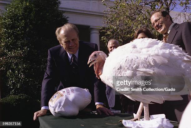 President Gerald R Ford is presented with a Thanksgiving turkey by the National Turkey Federation at the White House, Washington, DC, November 20,...