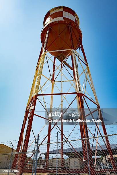 Red and white water tower within the secure area of the NASA Ames Research Center campus in the Silicon Valley town of Mountain View, California,...