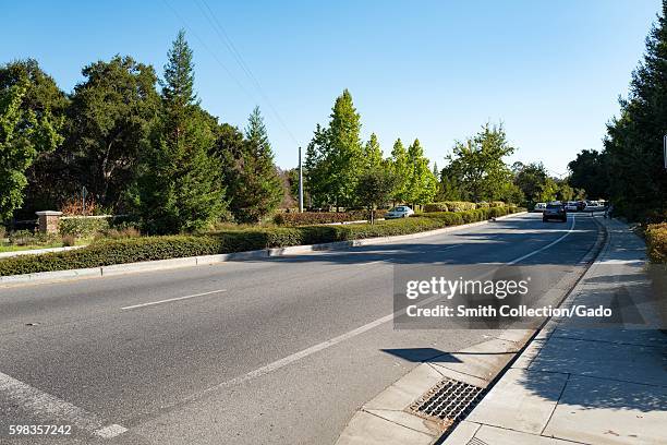 View down Sand Hill Road in the Silicon Valley town of Menlo Park, California, August 25, 2016. In Silicon Valley culture, "Sand Hill Road" is used...