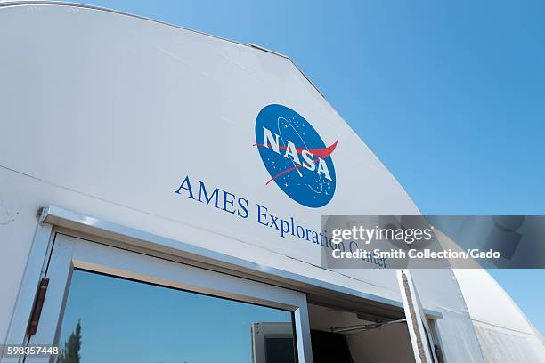 Logo and signage at entrance to NASA Ames Exploration Center, a visitor center at the NASA Ames Research Center campus in the Silicon Valley town of...