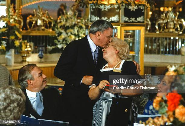 American entertainer Frank Sinatra with unidentified extras on set of a television commercial for the Golden Nugget Hotel and Casino, Atlantic City,...