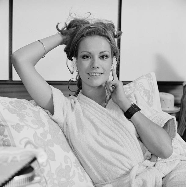 French actress Claudine Auger advertises objects sold in The Gadgeterie, the Paris boutique owned by Marianne Frey, Paris, France, 3rd October 1967.