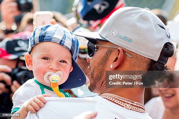 Lewis Hamilton of Mercedes and Great Britain with fans during previews for the Formula One Grand Prix of Italy at Autodromo di Monza on September 1,...