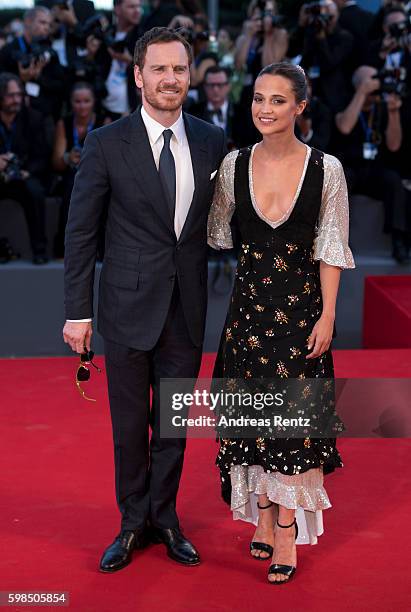 Actors Michael Fassbender and Alicia Vikander attend the premiere of 'The Light Between Oceans' during the 73rd Venice Film Festival at Sala Grande...