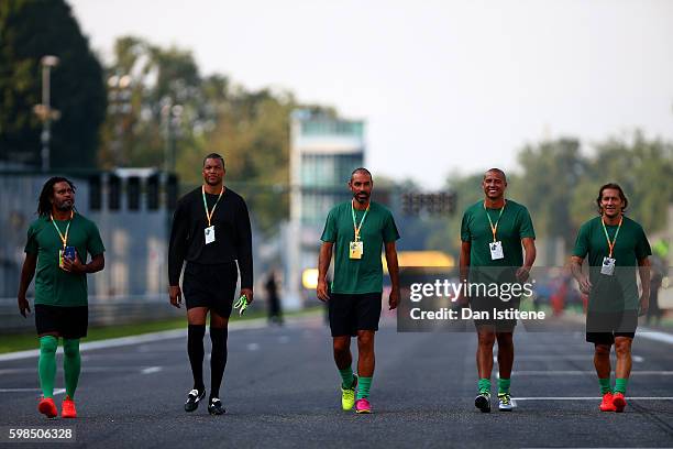 Christian Karembeu of France, Dida of Brazil, Robert Pires of France, David Trezeguet of France and Michel Salgado of Spain walk to the pitch before...