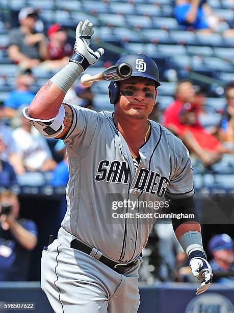 Oswaldo Arcia of the San Diego Padres reacts after making a fifth inning out against the Atlanta Braves at Turner Field on September 1, 2016 in...