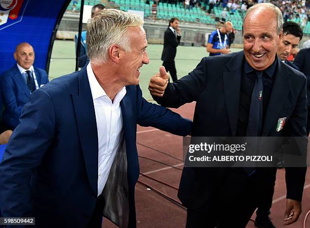 Italy's coach Giampiero Ventura salutes France's coach Didier Deschamps during the friendly football match Italy vs France on September 1, 2016 at...