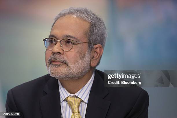 Bankim "Binky" Chadha, chief global strategist at Deutsche Bank Securities Inc., listens during a Bloomberg Television interview in New York, U.S.,...