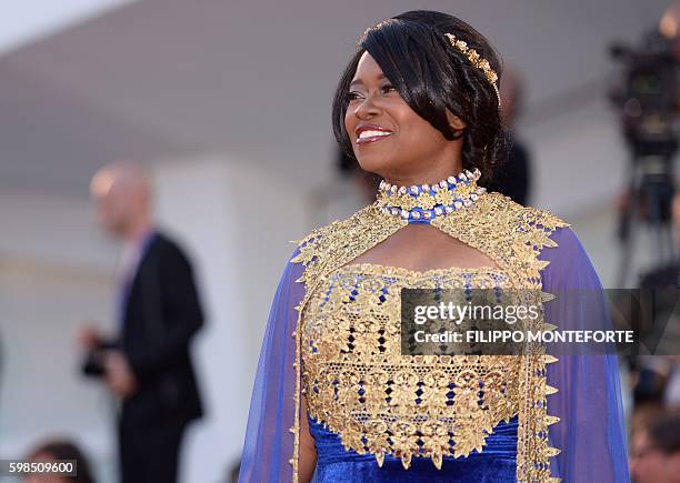 Taylor Re Lynn poses on the red carpet before the premiere of the movie "The Light Between Oceans" presented in competition at the 73rd Venice Film...