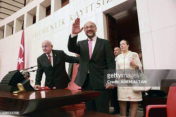 President of the European Parliament Martin Schulz gestures net to Speaker of the Turkish Grand National Assembly Ismail Kahraman during his visit of...