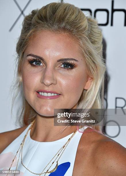 Rebecca Louise arrives at the Boohoo X Jordyn Woods Fashion Event at NeueHouse Hollywood on August 31, 2016 in Los Angeles, California.