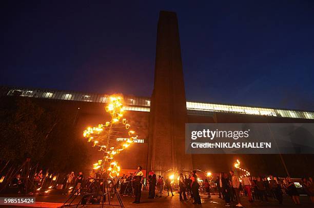 Fire Garden", designed by French fire masters Compagnie Carabosse, is performed outside of the Tate Modern in central London as part of the London's...