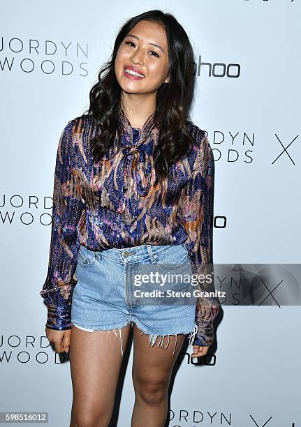 Haley Tju arrives at the Boohoo X Jordyn Woods Fashion Event at NeueHouse Hollywood on August 31, 2016 in Los Angeles, California.