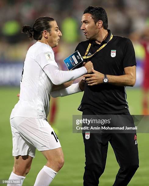 Iranian coach Javad Nekounam and Qatar's Players in fight during FIFA 2018 World Cup Qualifier match between Iran against Qatar on September 1, 2016...