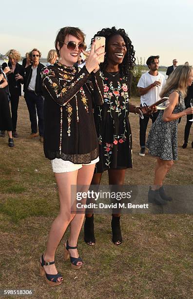 Lauren Estelle Jones and Jeni Cook attend Krug Island, a food and music experience hosted by Krug champagne on September 1, 2016 in Maldon, England.