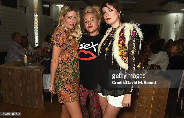 Gracie Egan, Jaime Winstone and Lauren Estelle Jones attend Krug Island, a food and music experience hosted by Krug champagne on September 1, 2016 in...