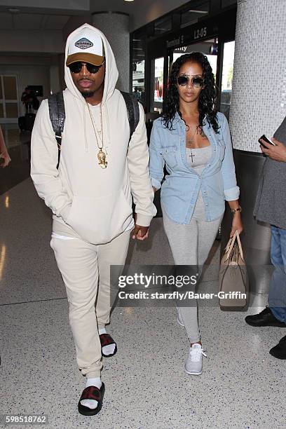 NeYo and Crystal Renay are seen at LAX on September 01, 2016 in Los Angeles, California.