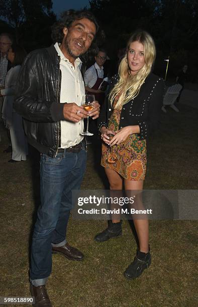 Derrick Santini and Gracie Egan attend Krug Island, a food and music experience hosted by Krug champagne on September 1, 2016 in Maldon, England.