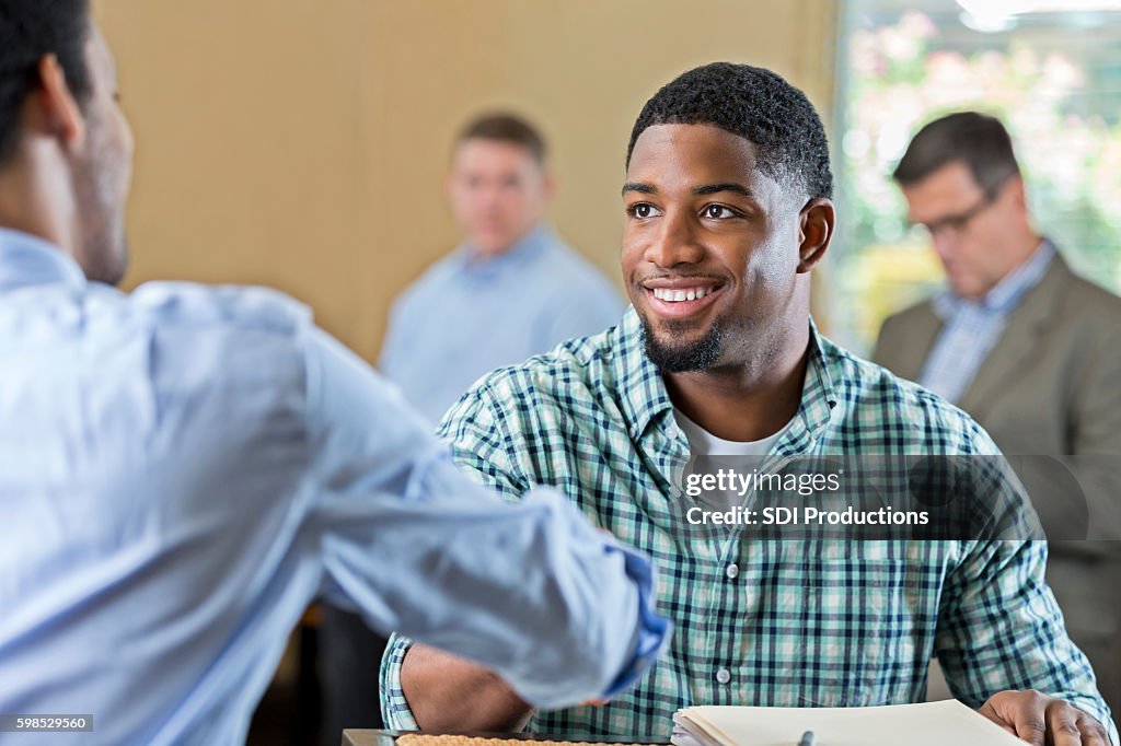 Handsome young African American man at job interview