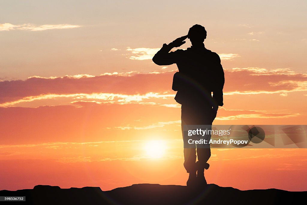 Soldier Saluting During Sunset