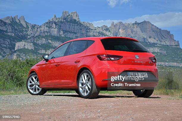 modern hatchback on the road - sunny leon stock pictures, royalty-free photos & images