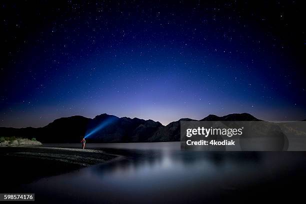 night sky - searchlight stock pictures, royalty-free photos & images