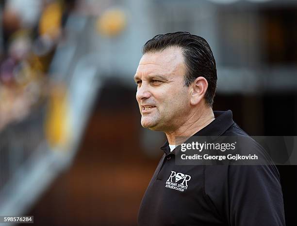 Sports agent Drew Rosenhaus of Rosenhaus Sports Representation looks on from the sideline before a National Football League preseason game between...