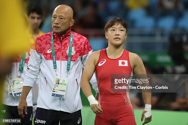 Day 12 Eri Tosaka of Japan with her coach Kazuhito Sakae during the Women's Freestyle 48 kg contest at the Carioca Arena 2 on August 17, 2016 in Rio...