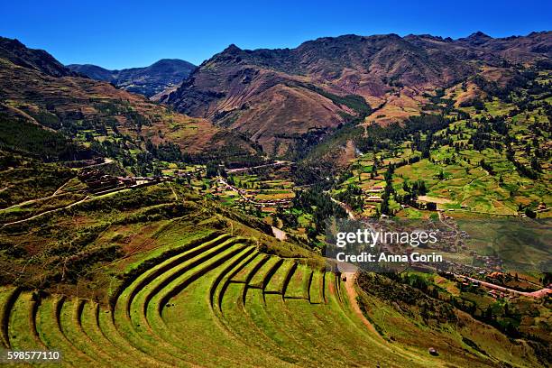 inca terraces of pisac on clear spring afternoon, sacred valley, peru - pisac district stock pictures, royalty-free photos & images