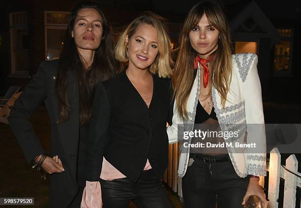 Leila Bartell, Tess Ward and Doina Ciobanu attend Krug Island, a food and music experience hosted by Krug champagne on September 1, 2016 in Maldon,...