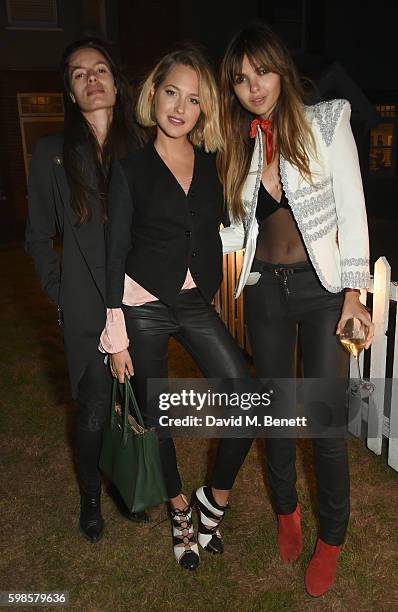 Leila Bartell, Tess Ward and Doina Ciobanu attend Krug Island, a food and music experience hosted by Krug champagne on September 1, 2016 in Maldon,...