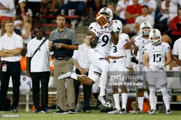 Linden Stephens of the Cincinnati Bearcats intercepts a pass during the fourth quarter of the game against the Tennessee-Martin Skyhawks at Nippert...