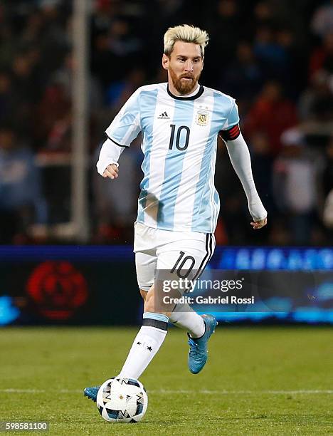 Lionel Messi of Argentina drives the ball during a match between Argentina and Uruguay as part of FIFA 2018 World Cup Qualifiers at Malvinas...