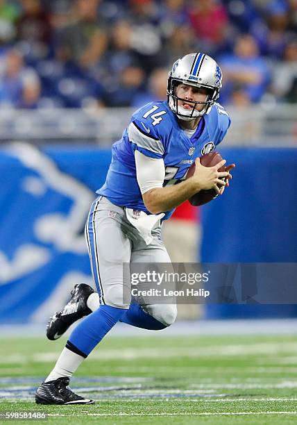 Jake Rudock of the Detroit Lions runs for a first down during the third quarter of the preseason game against the Buffalo Bills at Ford Field on...