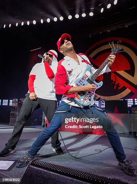 Real and Tom Morello of Prophets of Rage perform in support of the Nobody For President Tour 2016 at DTE Energy Music Theater on September 1, 2016 in...