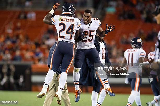 Running back Jordan Howard celebrates with running back Ka'Deem Carey of the Chicago Bears after Howard scored a touchdown during the fourth quarter...