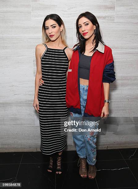 Jess Origliasso and Lisa Origliasso from The Veronicas pose during the launch of Fratelli Famous at Westfield Sydney on September 2, 2016 in Sydney,...