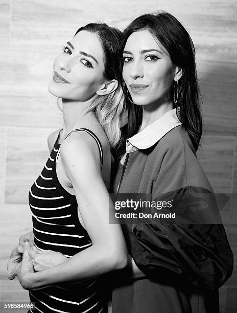 Jess Origliasso and Lisa Origliasso from The Veronicas pose during the launch of Fratelli Famous at Westfield Sydney on September 2, 2016 in Sydney,...