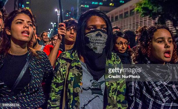 Demonstrator march during a protest against Brazil's President Michel Temer in Sao Paulo, Brazil, Thursday, Sept. 1, 2016. Temer was sworn in as...