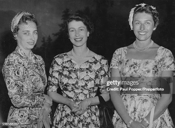 Queen Elizabeth II with Princess Ragnhild, Mrs Lorentzen and Princess Astrid, Mrs Ferner at the Royal Palace in Oslo, Norway, June 1955.