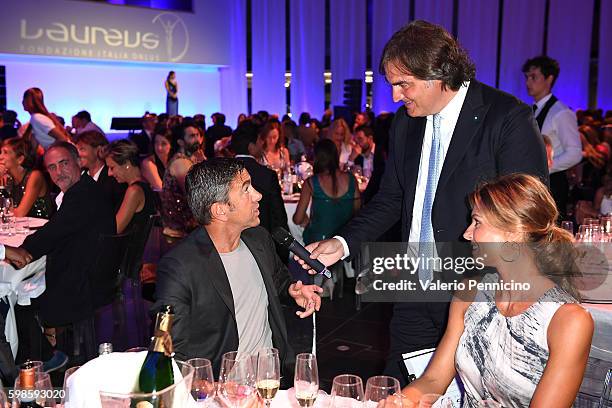 Alessandro Costacurta , Pierluigi Pardo and Martina Colombari attend during the Laureus F1 Charity Night at the Mercedes-Benz Spa on September 1,...