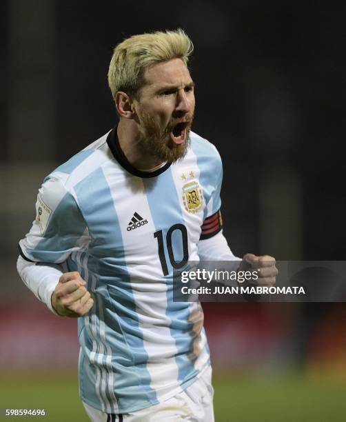 Argentina's Lionel Messi celebrates after scoring against Uruguay during the FIFA World Cup 2018 qualifier football match between Argentina and...